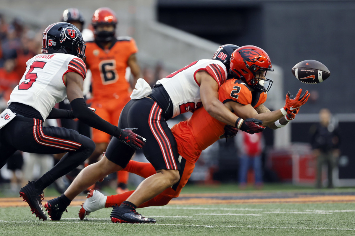 Sep 29, 2023; Corvallis, Oregon, USA; Oregon State Beavers wide receiver Anthony Gould (2) reaches for a pass as Utah Utes safety Stone Vaki (28) defends during the first half at Reser Stadium. Mandatory Credit: Soobum Im-USA TODAY Sports